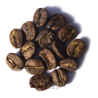 Kaffebönor under första krackningen